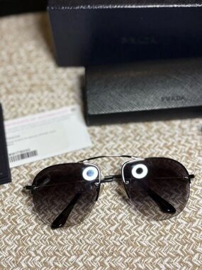 Prada Men’s Black Aviator Sunglasses with Dark Gray Gradient Lenses